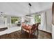 Elegant dining room featuring hardwood floors and plenty of natural light at 10571 Garfield St, Thornton, CO 80233