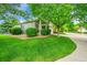 Charming home with a well-maintained lawn and attractive landscaping at 10571 Garfield St, Thornton, CO 80233