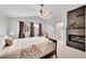 Inviting main bedroom with fireplace and ensuite bathroom at 10571 Garfield St, Thornton, CO 80233