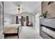 Spacious main bedroom with a fireplace, neutral carpet, and ample natural light at 10571 Garfield St, Thornton, CO 80233