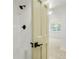 Modern bathroom featuring a sleek shower with a contemporary black shower head and fixtures at 10703 Jordan Ct, Parker, CO 80134