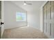 Bright bedroom with a ceiling fan and ample natural light, offering a comfortable and serene space at 10703 Jordan Ct, Parker, CO 80134