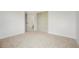 Bedroom features neutral carpeting, ample closet space, and a window view at 10703 Jordan Ct, Parker, CO 80134