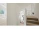 View of the well-lit staircase leading up to the second level of the home at 10703 Jordan Ct, Parker, CO 80134