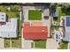 Aerial view of a home highlighting the backyard with artificial turf and its location within the neighborhood at 6327 Fenton St, Arvada, CO 80003