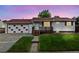 Charming single-Gathering home featuring a garage and front porch at 6327 Fenton St, Arvada, CO 80003