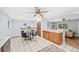 This kitchen has lots of space, a dining table, and lots of natural light at 6327 Fenton St, Arvada, CO 80003