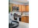 Well-equipped kitchen with stainless steel appliances and ample counter space at 6327 Fenton St, Arvada, CO 80003