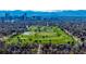 Breathtaking aerial view of Denver skyline and City Park, showcasing the city's beauty and recreational spaces at 2023 E 20Th Ave, Denver, CO 80205