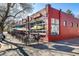 Restaurant exterior with outdoor seating and vibrant ambiance at 2023 E 20Th Ave, Denver, CO 80205