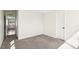 Bright bedroom with neutral carpet and a doorway to an adjoining room at 3632 Lipan St, Denver, CO 80211
