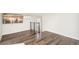 Bonus room with hardwood floors and a television mounted on the wall at 3632 Lipan St, Denver, CO 80211
