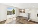 Bonus room with hardwood floors and sliding glass doors leading to an outside patio at 3632 Lipan St, Denver, CO 80211