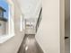Bright and airy hallway featuring hardwood floors and ample natural light at 3632 Lipan St, Denver, CO 80211