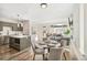 Bright, open concept with updated kitchen, living room, and dining area, perfect for modern living at 3632 Lipan St, Denver, CO 80211