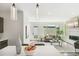 Bright open-concept living room featuring stylish furniture and a modern fireplace at 3632 Lipan St, Denver, CO 80211