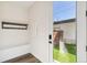 Mud room features a convenient bench, coat hooks, and seamless access to the outdoors at 3632 Lipan St, Denver, CO 80211