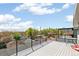 Rooftop deck with a metal railing, views of the city and table and chairs at 3632 Lipan St, Denver, CO 80211