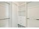 Spacious walk-in closet with ample shelving, drawers, and hanging rods for organization at 3632 Lipan St, Denver, CO 80211