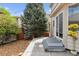 This backyard space has a concrete patio with decorative lighting at 10517 Madison St, Thornton, CO 80233