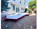 The backyard deck is perfect for outdoor entertaining with easy access to sliding doors and a gas grill at 10517 Madison St, Thornton, CO 80233