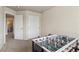 Bonus room with foosball table and plush carpeting at 10517 Madison St, Thornton, CO 80233
