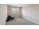Home exercise room with free weights, medicine ball, and large window at 10517 Madison St, Thornton, CO 80233