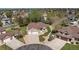 Aerial view of the property, showcasing its manicured landscaping and three-car garage at 14447 Inca Ct, Westminster, CO 80023
