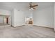 Spacious main bedroom with view to ensuite bath, large closet, and neutral colors at 14447 Inca Ct, Westminster, CO 80023