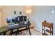Bedroom with an office space, desk, rolling chair and area rug at 1199 Hummingbird Cir, Longmont, CO 80501