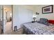 Bedroom featuring neutral decor and slider closet door at 1199 Hummingbird Cir, Longmont, CO 80501