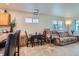 Cozy living space featuring a table set and comfortable sofa at 1199 Hummingbird Cir, Longmont, CO 80501