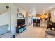Bright living room with open floor plan, decor and staircase access at 1199 Hummingbird Cir, Longmont, CO 80501