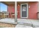Inviting front porch with seating, perfect for relaxing outdoors at 1199 Hummingbird Cir, Longmont, CO 80501