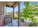 Cozy front porch with seating area, perfect for enjoying the neighborhood views at 1199 Hummingbird Cir, Longmont, CO 80501