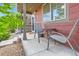 Inviting front porch with outdoor seating, creating a relaxing space at 1199 Hummingbird Cir, Longmont, CO 80501