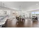 Bright living space with eat-in kitchen and modern furnishings, creating a comfortable atmosphere at 2230 Rim Ridge Dr, Castle Pines, CO 80108