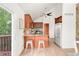 Updated kitchen featuring granite counters, stainless steel appliances, and a breakfast bar at 3260 Bit Rd, Evergreen, CO 80439