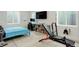 Versatile room with space for a bedroom, office, and workout equipment at 7029 Sagerock St, Castle Pines, CO 80108
