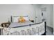 Bright bedroom featuring a decorative headboard and ample natural light at 7029 Sagerock St, Castle Pines, CO 80108
