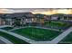 Attractive home with a well-manicured lawn and charming backyard at 7029 Sagerock St, Castle Pines, CO 80108
