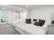 Inviting living space with plush sofa and a cozy beanbag chair at 7029 Sagerock St, Castle Pines, CO 80108
