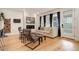 Stylish living room boasting natural light, a sleek fireplace, and comfortable furnishings for relaxation at 7029 Sagerock St, Castle Pines, CO 80108