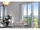 Bright dining area showcasing a sliding glass door with scenic outdoor views at 14803 E 119Th Ave, Commerce City, CO 80603