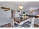Charming dining area featuring a farmhouse-style table and decorative accents at 14803 E 119Th Ave, Commerce City, CO 80603