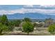 Scenic view of the majestic mountains from the property showcasing the natural beauty of the surroundings at 14803 E 119Th Ave, Commerce City, CO 80603