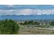 Breathtaking mountain views from the property, highlighting the serene and picturesque environment at 14803 E 119Th Ave, Commerce City, CO 80603