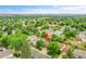 Aerial view of the neighborhood and backyard with mature trees at 10301 Owens Cir, Broomfield, CO 80021