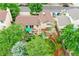 Aerial view of backyard with wood deck featuring outdoor seating and an umbrella at 10301 Owens Cir, Broomfield, CO 80021