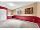 This is a finished basement bedroom with a window, carpet, and a closet at 10301 Owens Cir, Broomfield, CO 80021